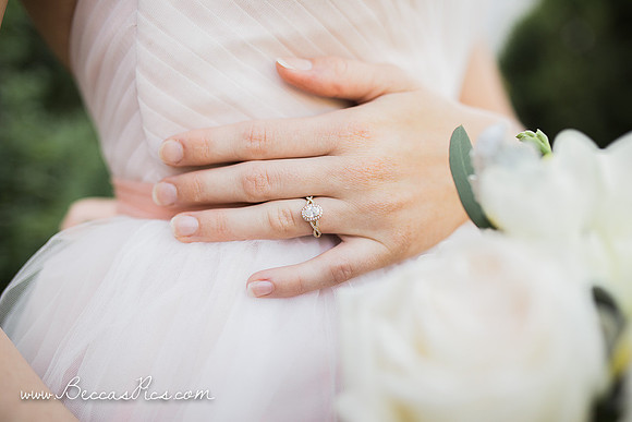 oval gold and diamond solitaire engagement ring
